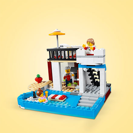 Lego creator modular hotsell sweet surprises 31077